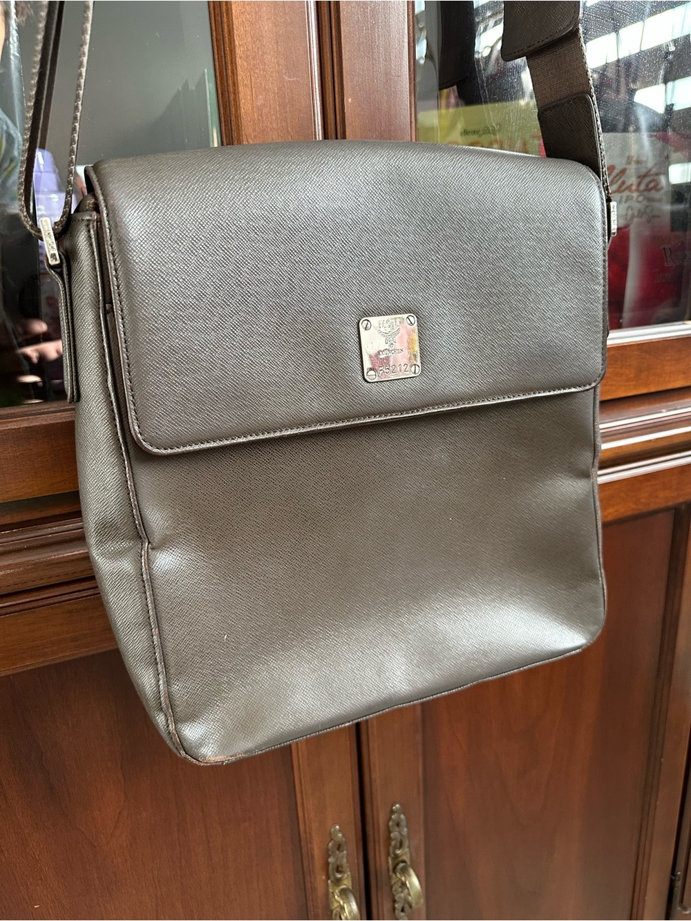 MCM Men's Dark Brown Leather Messenger Bag with Logo Plaque